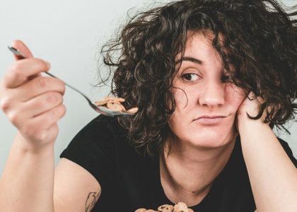 Gril eating cereal